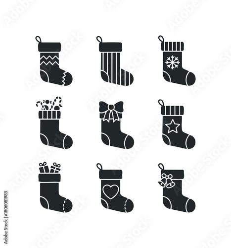 Collection of nine various black silhouette Christmas stockings with decorative patterns and filled with holiday items