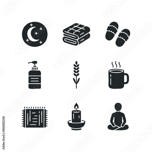 Set of silhouette icons representing self care and relaxation elements including moon and stars, folded towels, slippers, lotion dispenser, wheat stalk, hot drink, bath mat, candle, person meditating