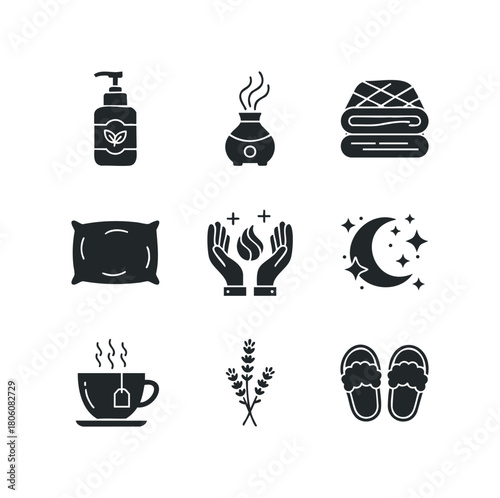 Set of black icons for relaxation and wellness, including essential oil diffuser, stacked towels, pillow, aromatherapy hands, moon and stars, tea cup, lavender, and slippers