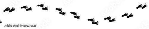 a winding path of footprints: black silhouette on white background