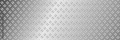 Shiny silver metal diamond plate surface with chrome tread pattern creating a repeat industrial texture ideal for vector backgrounds aluminium material and vintage inspired art