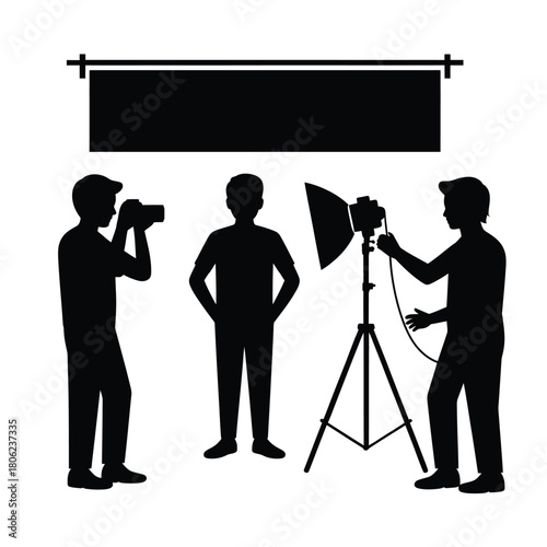Silhouette of a photography studio setup with crew and equipment