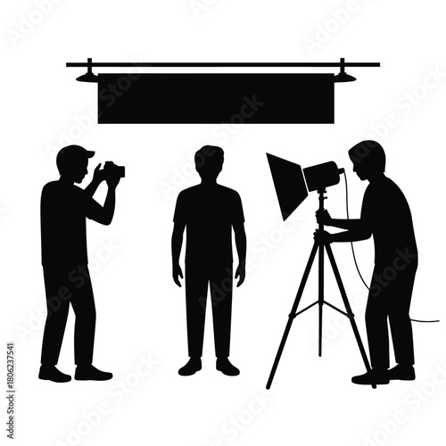 Silhouette of a photography studio setup with a model and crew