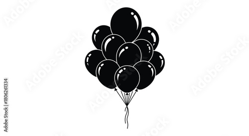 A cluster of shiny black balloons tied together with string