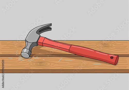 Hammer Resting on Wooden Board for Construction.