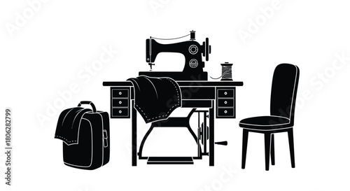 Vintage sewing machine setup with chair bag and draped fabric