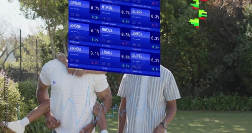 Dad carrying child walking lawn with pal, sparking finance overlays and charts while discussing ROI