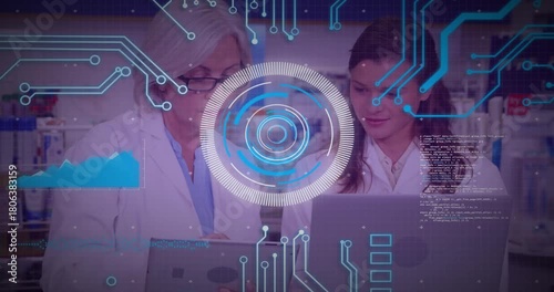 Senior scientist tapping tablet and mentoring junior tech while reviewing lab data, HUD animating