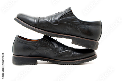 Black dress shoes on a white background