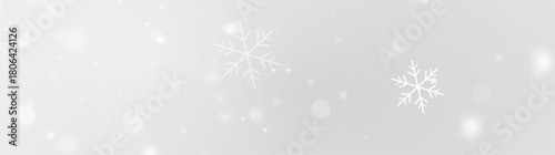 Magic falling snowflakes on cold transparent winter night sky
