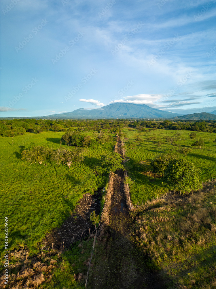 Naklejka premium Aerial view of a beef cattle farm on sustainable mountain farm in Panama, Central America - stock photo 