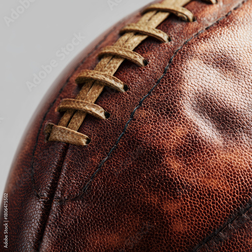 Vintage American football showing textured leather and laces