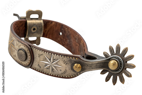 Close-up shot of a vintage silver and leather cowboy spur with intricate detailing and a starburst pattern