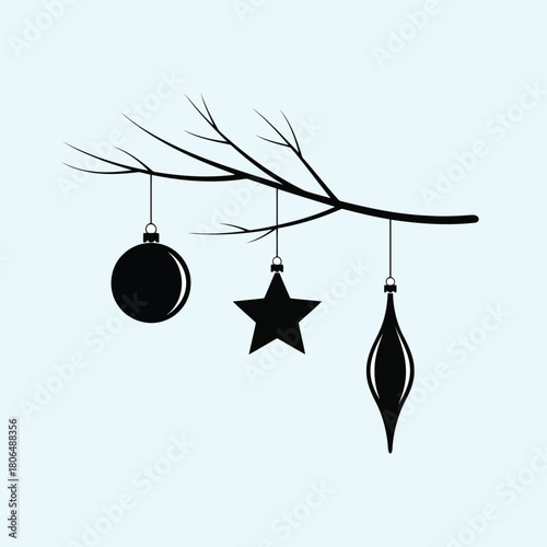 Black Christmas ornaments hanging from bare tree branch