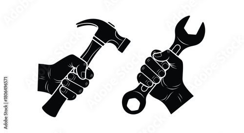 Hands holding a hammer and wrench tools for construction and repair