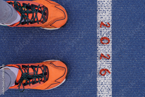 2026 New Year. The beginning of the year represented by the number 2026 at the starting line