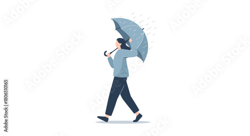 Woman walking with an umbrella in the rain