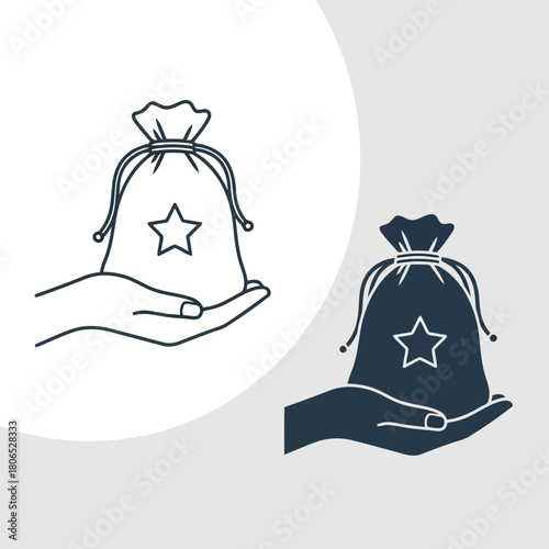 Hand holding a bag with star isolated on a symbol of gift, reward, or special offering