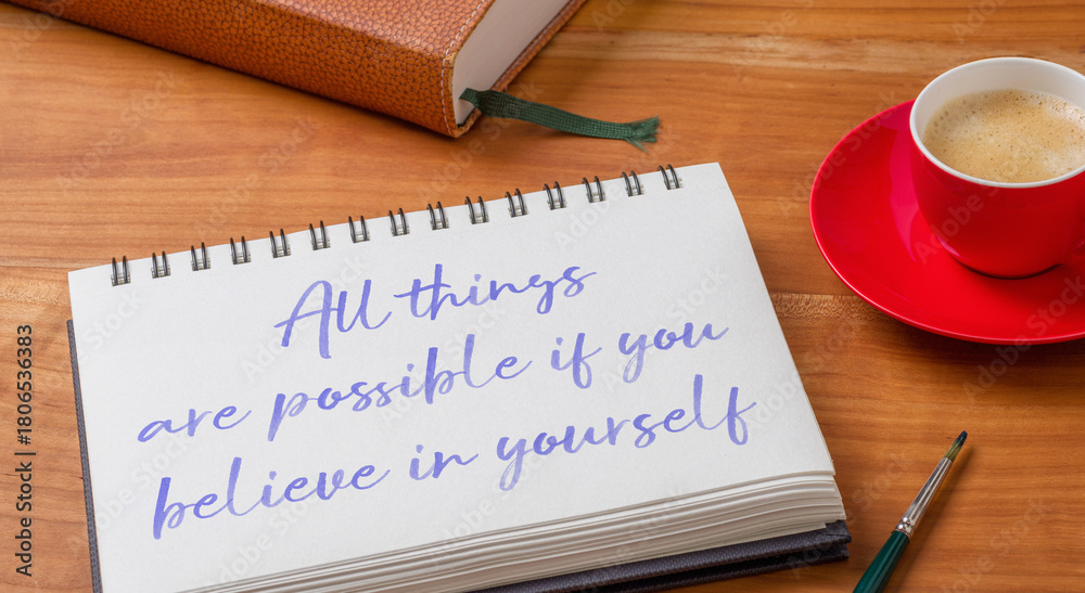 Fototapeta premium Notepad on a desk - All things are possible if you believe in yourself