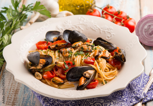 spaghetti with mussels tomatoes and parsley