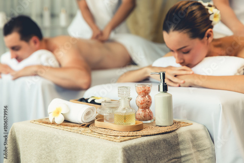 Photography Aromatherapy massage on daylight ambiance or spa salon composition setup with focus decor and spa accessories on blur woman enjoying blissful aroma spa massage in resort or hotel background