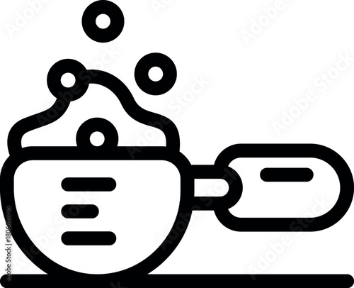 Measuring cup filled with bubbling detergent is ready for laundry and dishwashing