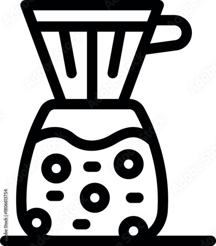 Brewing fresh coffee using a ceramic pour over coffee maker with a paper filter