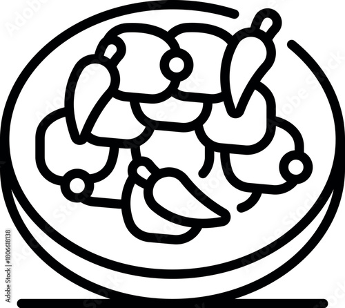 Delicious chicken curry dish seasoned with chili peppers, served on a plate, representing a spicy and flavorful meal