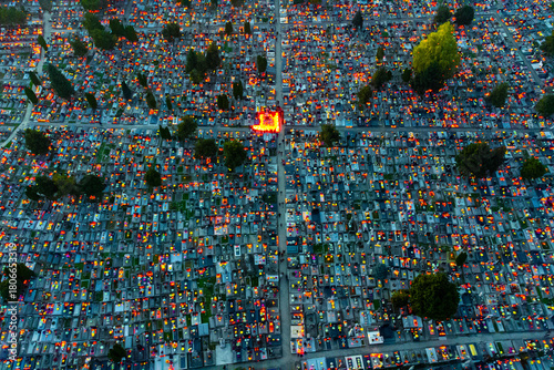 Aerial view of countless candles flicker across the cemetery at dusk, creating a poignant tapestry of light and shadow., Osijek, Osijek-Baranja County, Croatia.