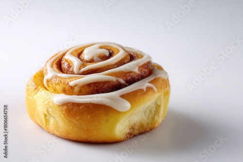 Wallpaper Mural Single Cinnamon Roll with Icing Drizzle on a White Background for Dessert and Bakery Use Torontodigital.ca