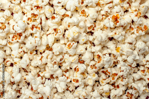 Full frame background texture of fluffy, freshly popped white and yellow popcorn