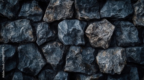 Dark Textured Stone Wall, A Captivating Display of Natural Rock Formation