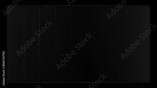 Old Film Grain Texture Overlay with Heavy Scratches and Dust.Black and white vintage film texture. Realistic overlay with scratches, dust, and noise. Ideal for retro cinema effects, grunge backgrounds