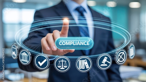 Business professional interacts with glowing holographic interface displaying compliance and regulatory icons