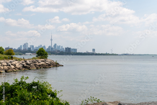 view of the rocks and city of Toronto over Lake Ontario