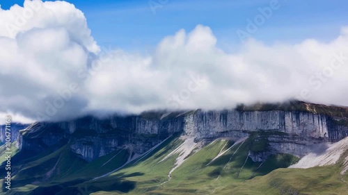“Majestic Alpine Majesty: Clouds Drifting Over Rugged Peaks | Serene Nature Escape | Epic Mountain Scenery for Travel & Wellness Brands”

