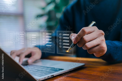 A person digitally signing a smart contract using a pen on a laptop, showcasing blockchain agreement technology, secure digital authorization, automated document management in a modern tech workspace.