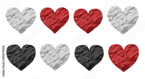 Collection of eight crumpled heart shapes in red, white, and black colors on a white background.