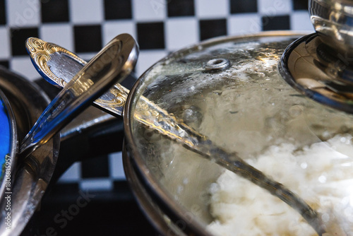 Cooking food in two pots
