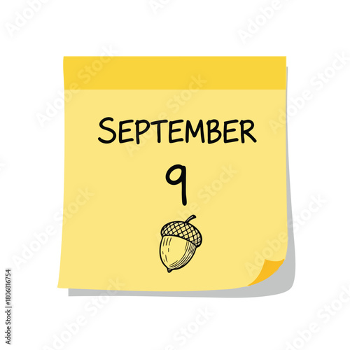 September ninth reminder with an acorn illustration on a yellow sticky note evoking the autumn season marked on a memo