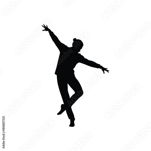 Silhouette of a dancer in a dynamic pose with arms outstretched