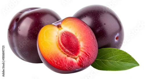 Two whole plums and a half plum isolated on transparent background, studio shot