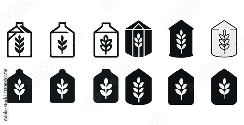 Set of black and white grain silo icons with wheat symbol