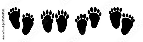 Set of diverse black animal paw prints and human foot tracks