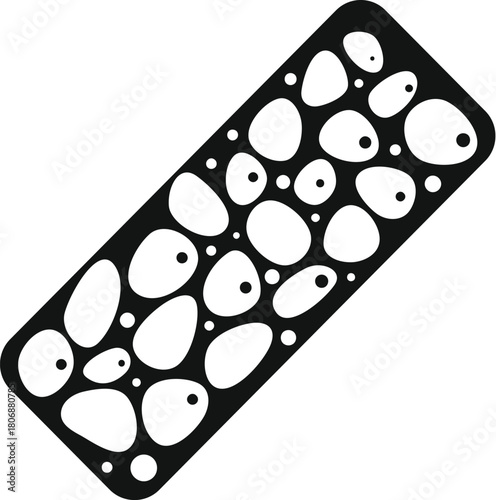 Rectangular piece of fermented soybeans showing the characteristic white mycelium and sporangia of rhizopus oligosporus