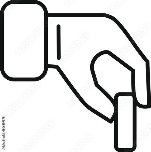 Close up of a hand delicately holding a small, rectangular object between the index finger and thumb, suggesting precision and care