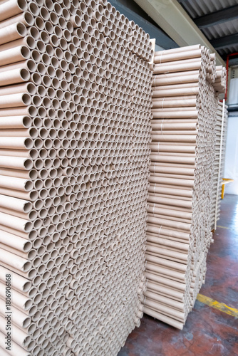 Stack of cylindrical cardboard tubes.