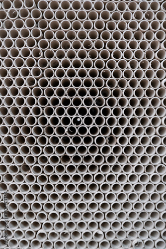 Stack of cylindrical cardboard tubes.