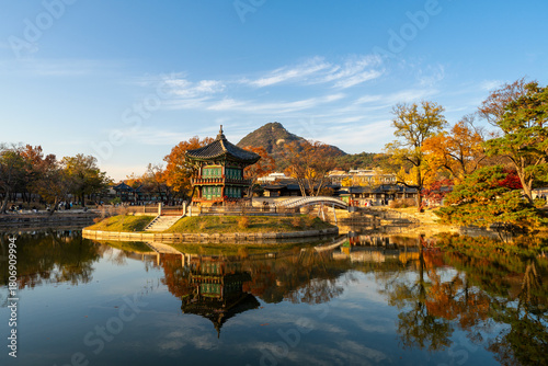 Wallpaper Mural gyeongbokgung palace in autumn with blur maple in foreground, Seoul, South Korea. Torontodigital.ca