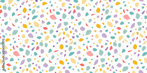 Colorful terrazzo pattern with irregular shapes on white background for modern design